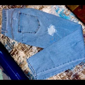 Light blue jeans with rips